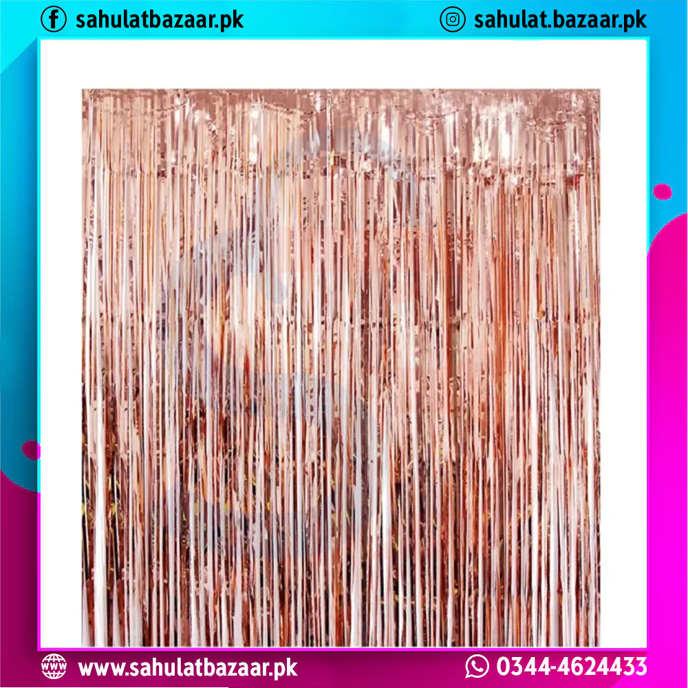 Rose gold tinsel curtain on a white background with colorful border
