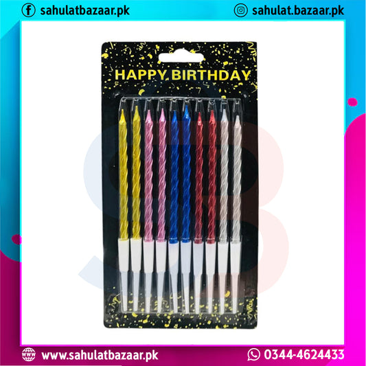Pack of colorful birthday candles with 'Happy Birthday' text on packaging.