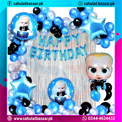 Birthday decoration with balloons and a character figure, featuring 'Happy Birthday' text.