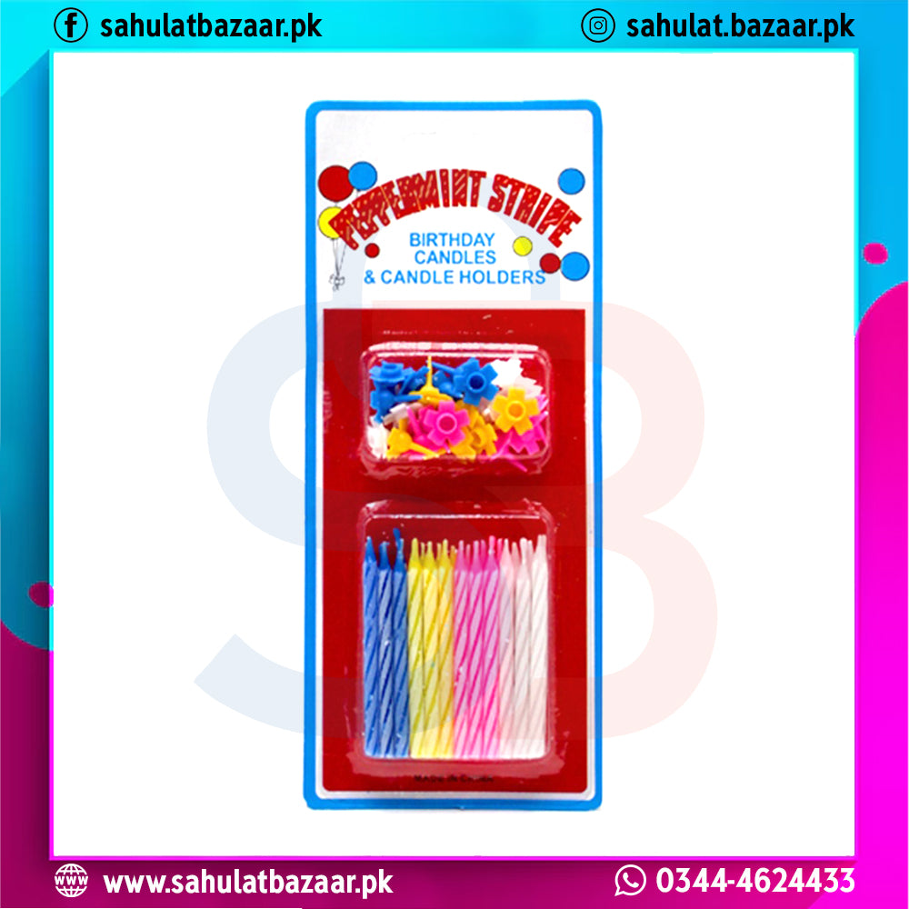 Packaged birthday candles and holders with colorful design on a white background