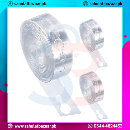 Transparent plastic roll with two cut pieces on a white background, branded 'sahulatbazaar.pk'.