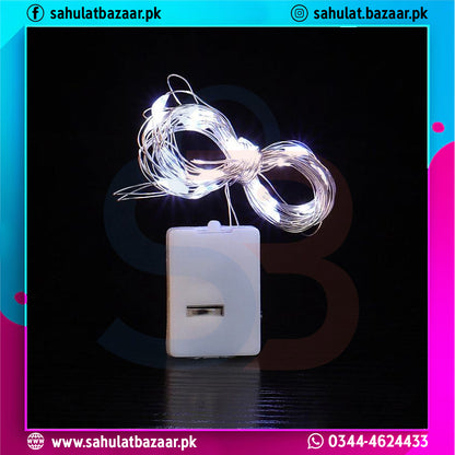 String lights with a white adapter on a black background, featuring the brand 'sahulatbazaar.pk'.