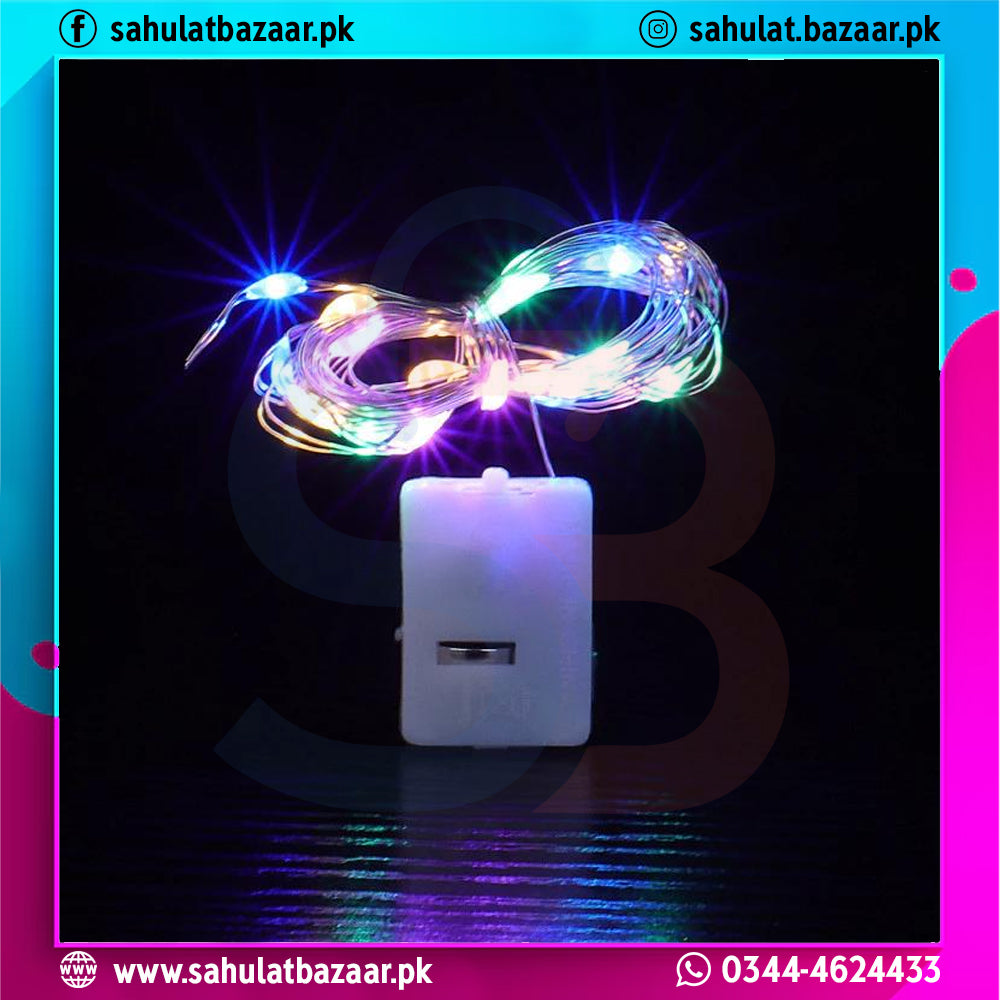 Colorful LED string lights with a white power adapter on a dark background, branded 'sahulatbazaar.pk'.