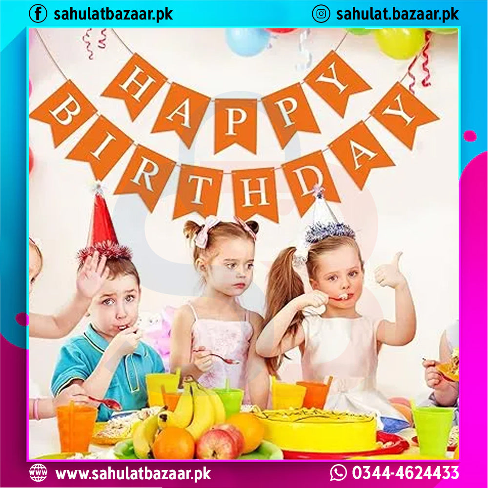 Children celebrating a birthday with a 'Happy Birthday' banner and colorful decorations.