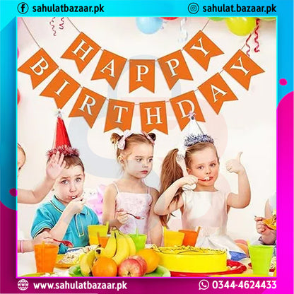 Children celebrating a birthday with a 'Happy Birthday' banner and colorful decorations.