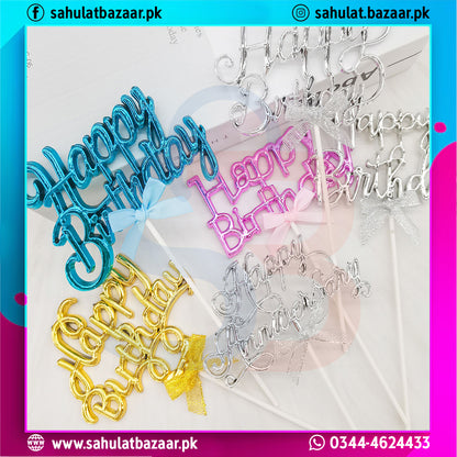 Set of colorful 'Happy Birthday' cake toppers with decorative ribbons on a white background.