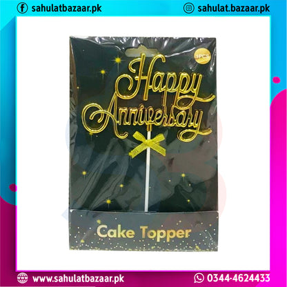 Happy Anniversary cake topper packaging with gold text on a black background
