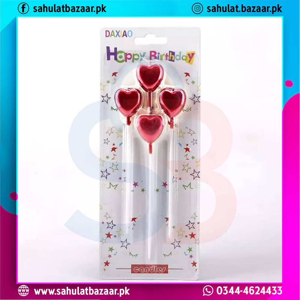 Red heart-shaped candles in packaging with 'Happy Birthday' text on a colorful background.