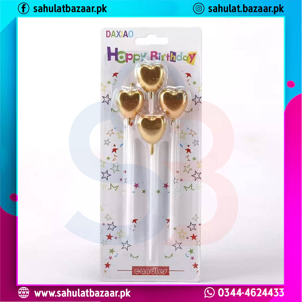 Gold heart-shaped candles in packaging with 'Happy Birthday' text on a colorful border.