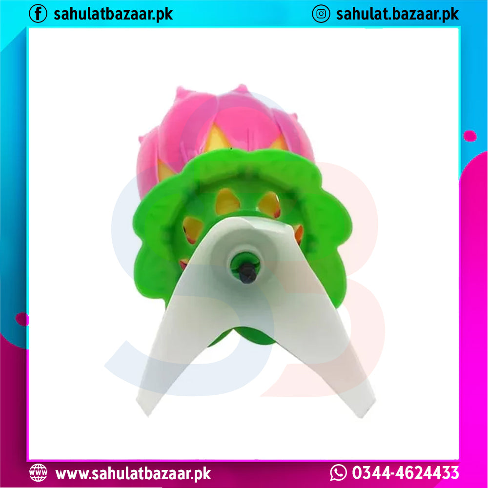 Colorful plastic tool with a pink top and green base on a white background