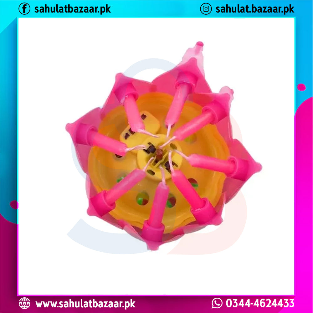 Pink and yellow plastic tool with multiple prongs on a white background