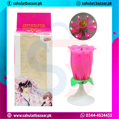 Pink rose-shaped candle with packaging featuring anime characters on a white background.