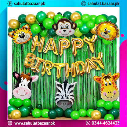 Birthday decoration with animal-themed balloons and 'Happy Birthday' text against a green curtain background.